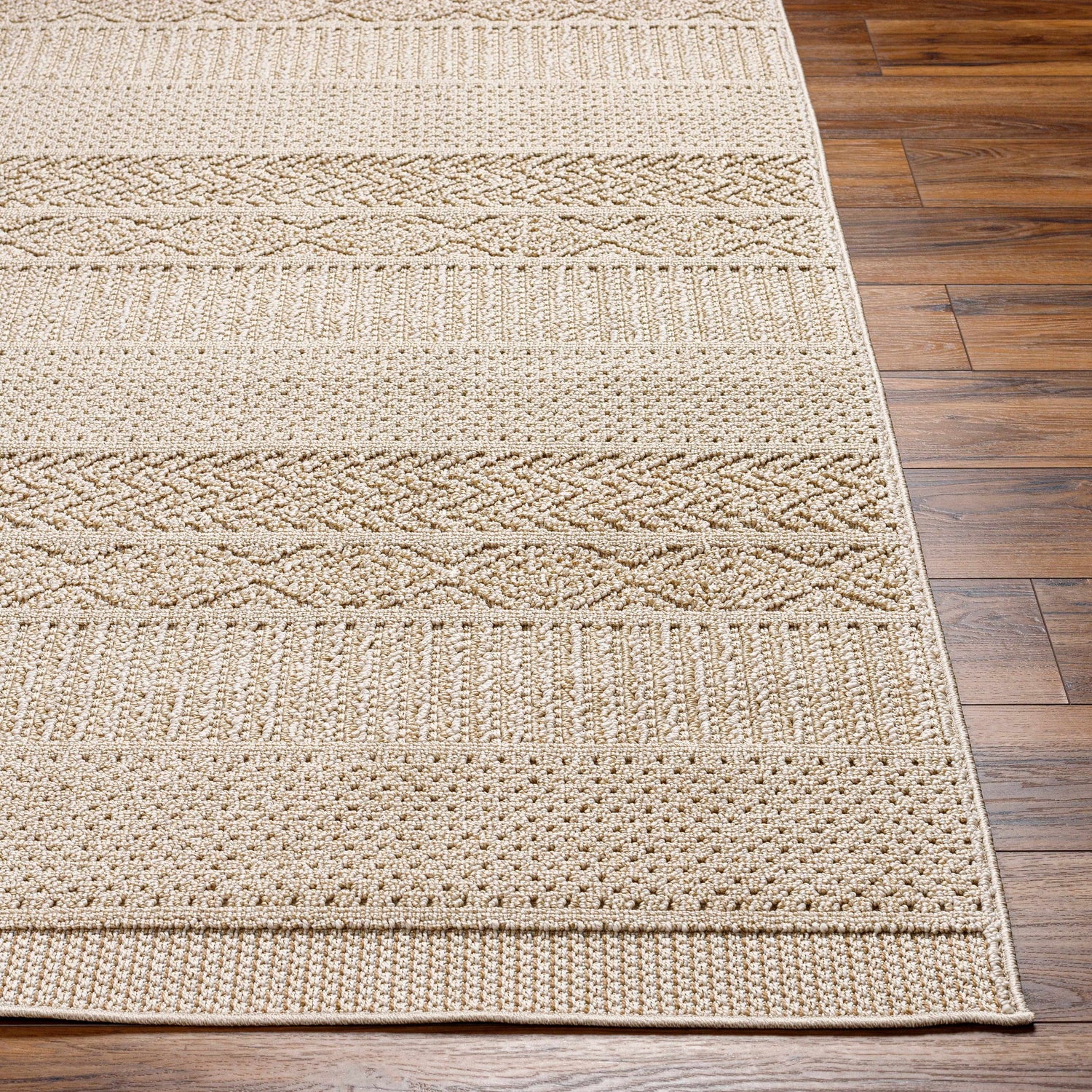 Corom Beige Area Rug - Clearance