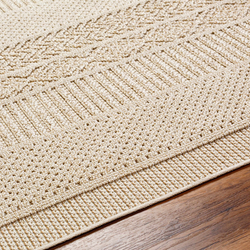 Corom Beige Area Rug - Clearance