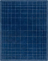 Close-up of the Sedna Navy Wool Area Rug, a hand-tufted rug with a geometric grid pattern in navy and gray. Design-Rectangle-810