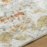 Close up of the Ouida Floral Rug showing its copper, light silver, and light wood colors and farmhouse style. Texture