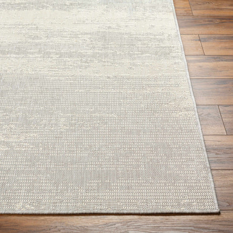 Cline Cream Area Rug - Clearance