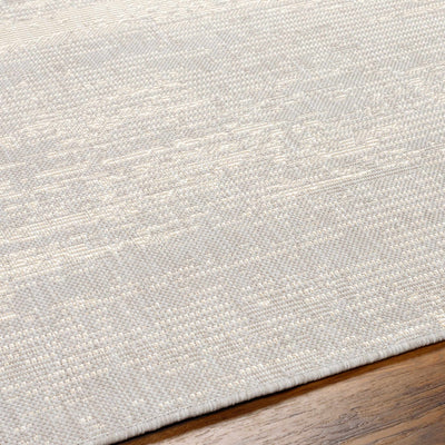 Cline Cream Area Rug