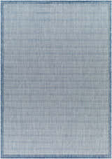 Close-up of the Genet Blue Area Rug showing a herringbone pattern in denim and arctic stone colors. Design-Rectangle-537