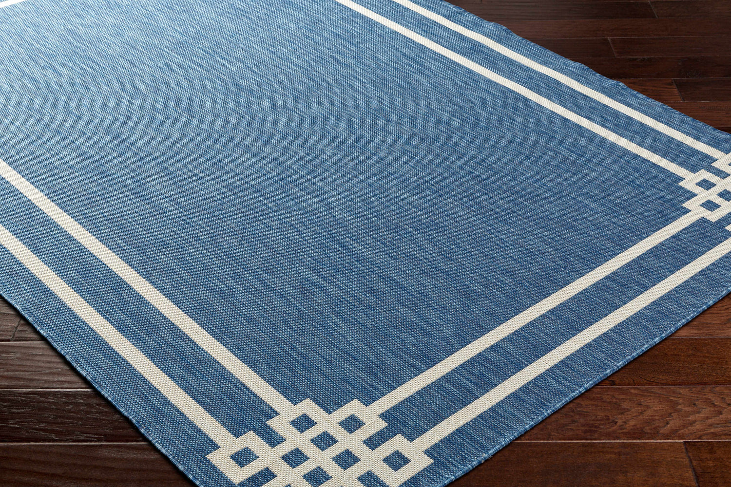 Ilori Blue Area Rug - Clearance