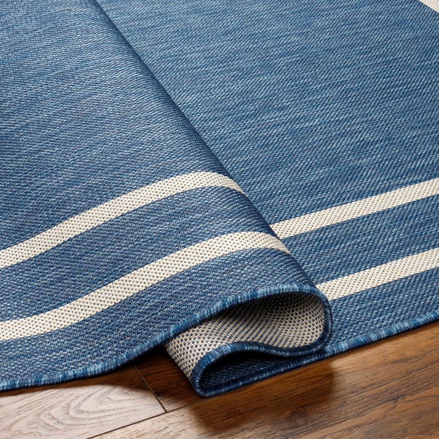 Ilori Blue Area Rug - Clearance