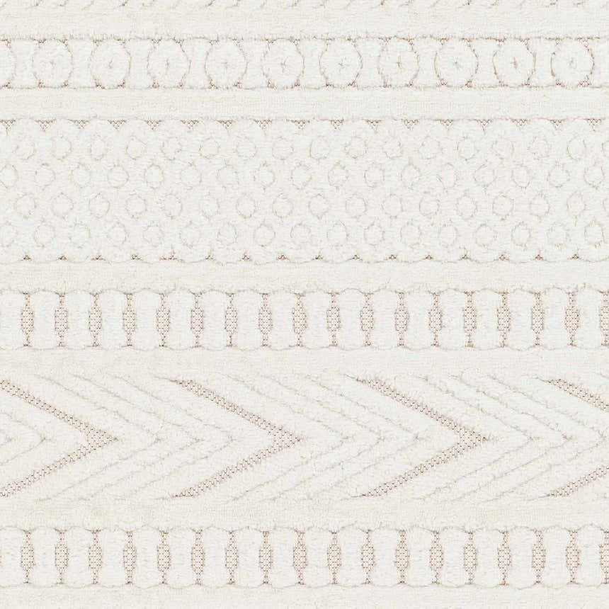 Close-up of the Jove Cream Outdoor Rug. Southwestern style with geometric and circular patterns in cream and beige. Swatch