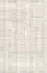 Close-up of a hand woven Lenci Wool Area Rug in beige and rose cream, showing the textured wool knit pattern. Design-Rectangle-576