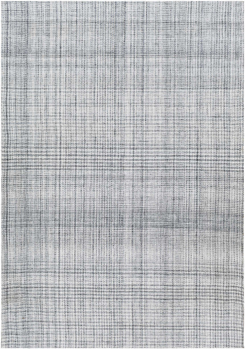 Close-up of the Jezel Gray Area Rug, a hand-woven rug with a subtle gray plaid pattern and soft, textured yarn. Design-Rectangle-576