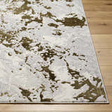 Close up of Jaren Light Gray Area Rug showing abstract gold and gray pattern on wood floor. Contemporary style. Front