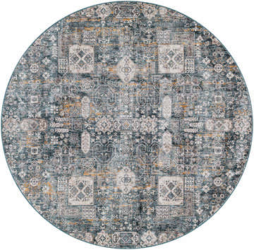 Close-up of round Stacyville Luxe Fringe Rug. Traditional design in blue, camel, and gray hues. Machine woven polyester texture. Design-Round-53