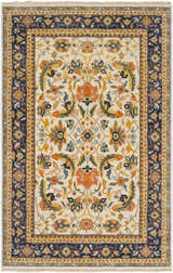 Close-up of the Starford Carpet. Hand-knotted wool rug with a traditional floral pattern in cream, blue, orange, and yellow. Design-Rectangle-5686