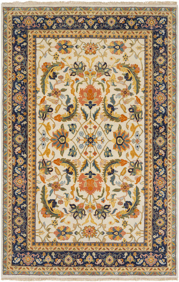 Close-up of the Starford Carpet. Hand-knotted wool rug with a traditional floral pattern in cream, blue, orange, and yellow. Design-Rectangle-5686