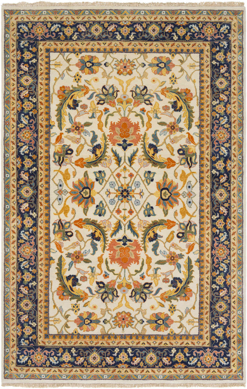 Close-up of the Starford Carpet. Hand-knotted wool rug with a traditional floral pattern in cream, blue, orange, and yellow. Design-Rectangle-5686