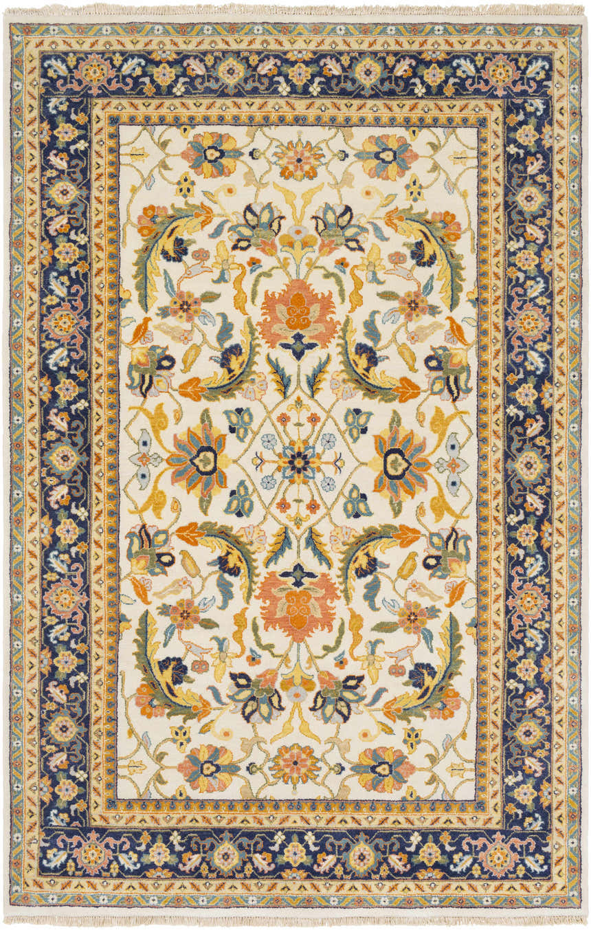 Close-up of the Starford Carpet: a hand-knotted, rectangular rug with a traditional floral pattern in cream, navy, and gold. Design-Rectangle-69