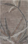 Close-up of the hand-knotted Steinhatchee Area Rug. Contemporary design with brown, black, and white dotted pattern on a taupe background. Design-Rectangle-58