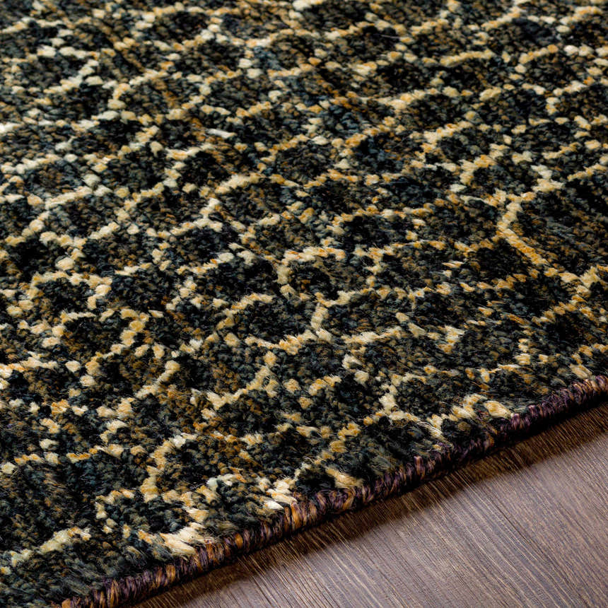 Close-up of the textured Stephentown Clearance Jute Rug. Features a contemporary black and tan geometric pattern. Texture