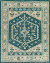 Detailed view of the Stepps Area Rug, showcasing its aqua, beige, and sage bohemian design and hand-knotted wool texture. Design-Rectangle-810