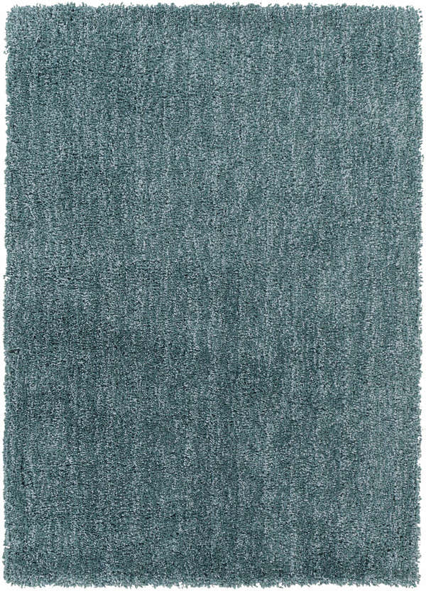 Close-up of the plush Stratford Area Rug in teal. Hand-woven polyester shag rug with a soft, textured feel. Design-Rectangle