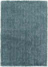 Close-up of the plush Stratford Area Rug in teal. Hand-woven polyester shag rug with a soft, textured feel. Design-Rectangle