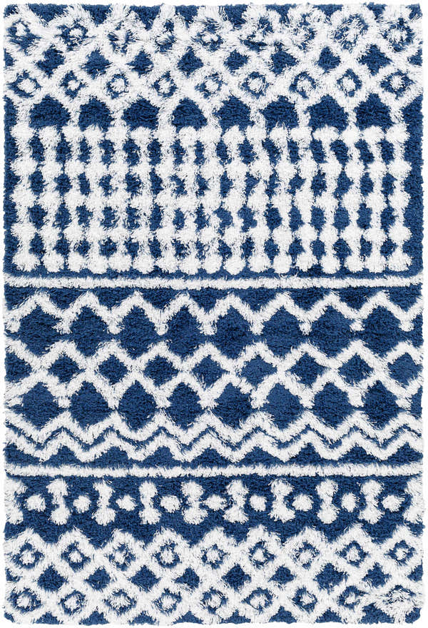 Close-up of the Suke Area Rug - Clearance. Shag rug with a geometric pattern in arctic stone, white, and dark harbor blue. Design-Rectangle-5373
