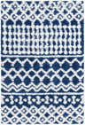 Close-up of the Suke Area Rug - Clearance. Shag rug with a geometric pattern in arctic stone, white, and dark harbor blue. Design-Rectangle-5373
