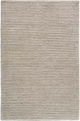 Close-up of the Sula Area Rug. Hand-woven wool rug with cream and gray horizontal stripes. Contemporary, natural fibers. Design-Rectangle-576