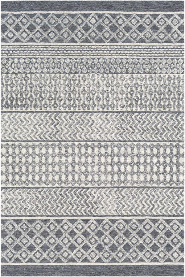 Close-up of the hand-tufted Sullivan Area Rug. Bohemian style with geometric patterns in black, charcoal, and light beige wool. Design-Rectangle-576