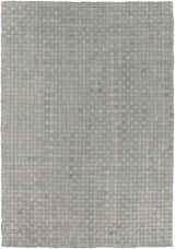 Close-up of the gray Sunburst Area Rug. Hand-woven leather rug with a contemporary, animal-inspired design. Design-Rectangle-576