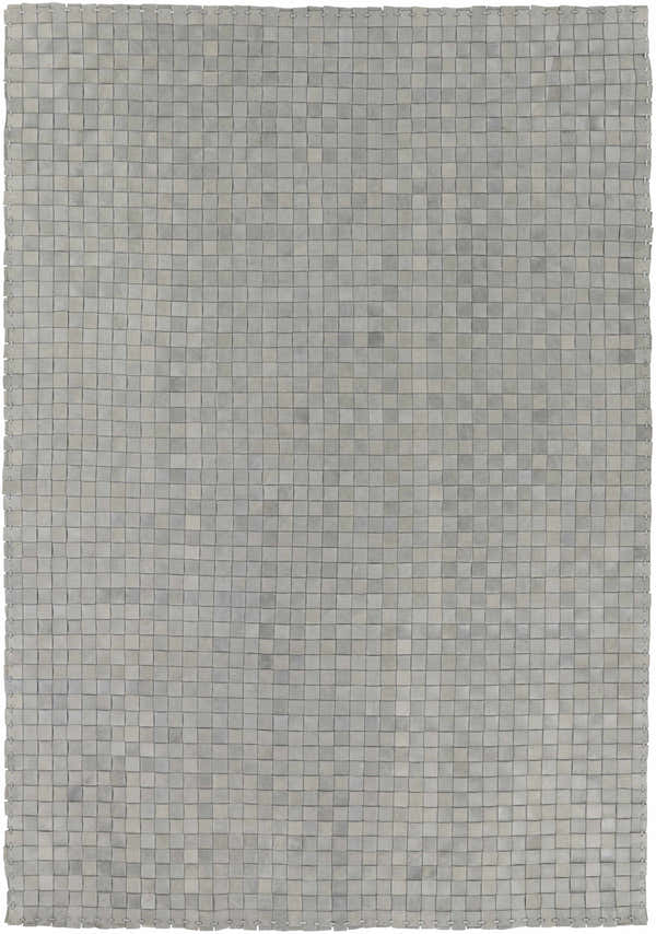 Close-up of the gray Sunburst Area Rug. Hand-woven leather rug with a contemporary, animal-inspired design. Design-Rectangle-576