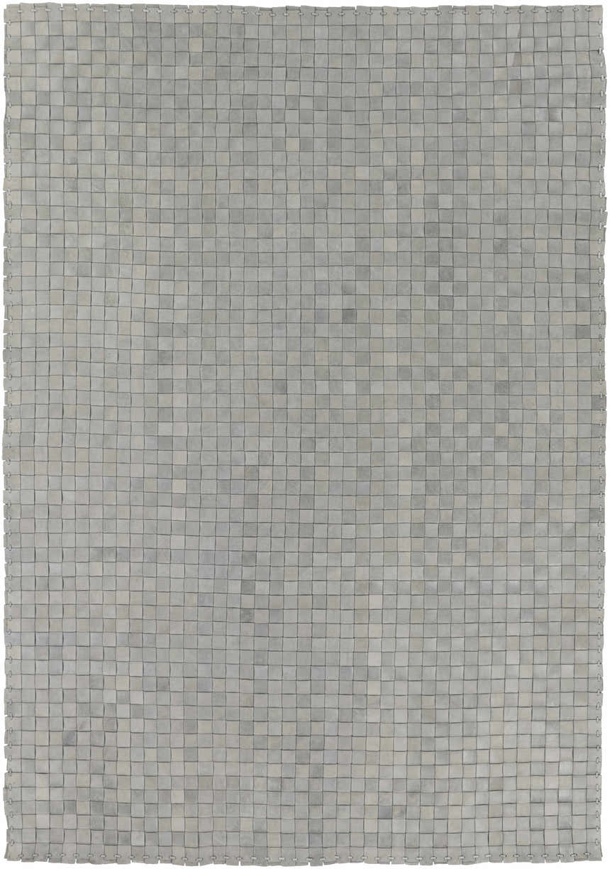 Close-up of the gray Sunburst Area Rug. Hand-woven leather rug with a contemporary, animal-inspired design. Design-Rectangle-576