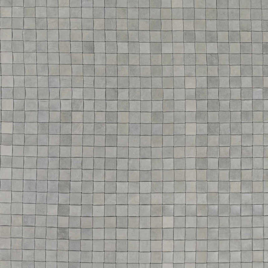 Close-up of the Sunburst Area Rug. Gray, hand-woven leather squares create a contemporary, textured pattern. Swatch