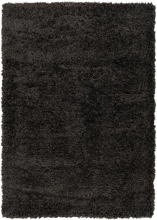 Close-up of the Black Allon Area Rug, a soft, textured shag rug in dark black and gray tones. Design-Rectangle-537