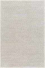 Close-up of the hand woven Oved Area Rug. The texture is nubby in cloud gray and nutmeg tones. Design-Rectangle-576