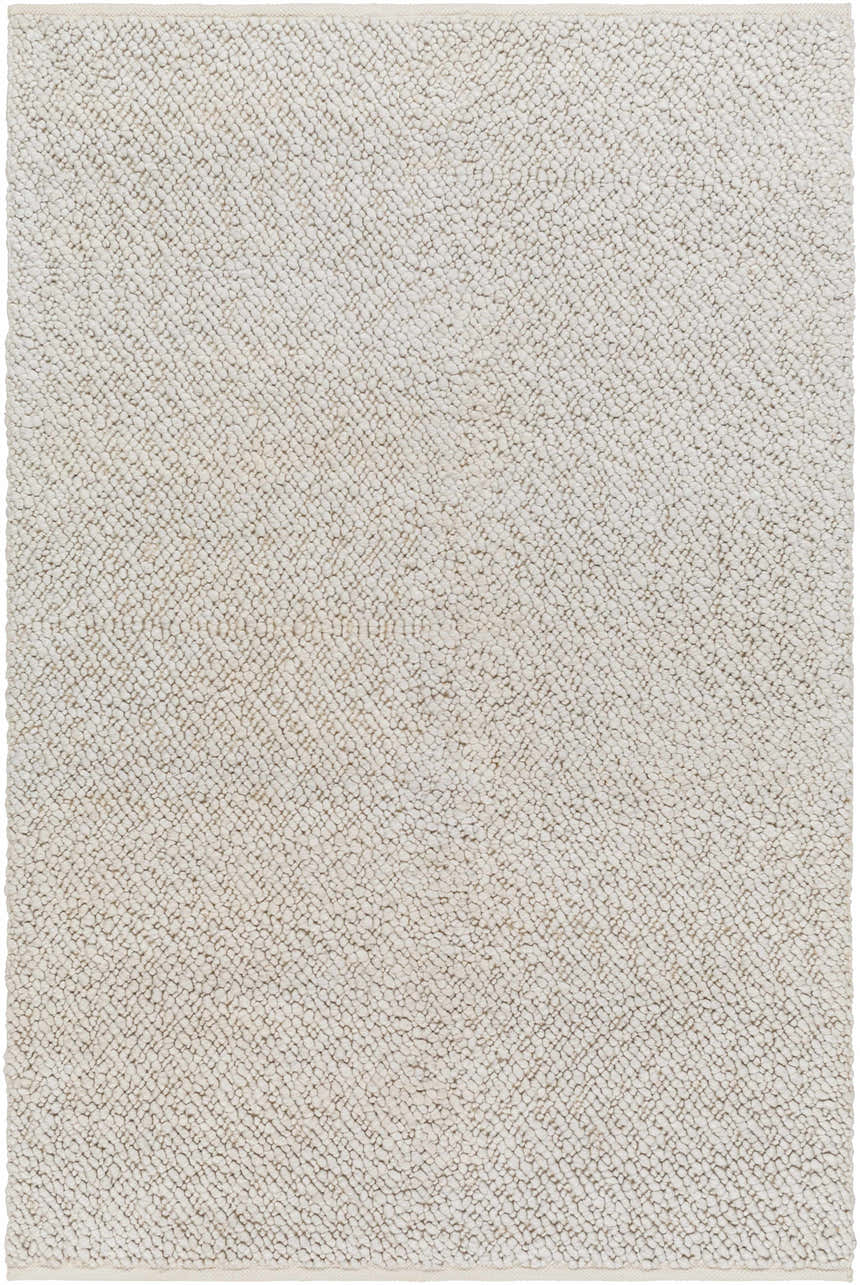Close-up of the hand woven Oved Area Rug. The texture is nubby in cloud gray and nutmeg tones. Design-Rectangle-576