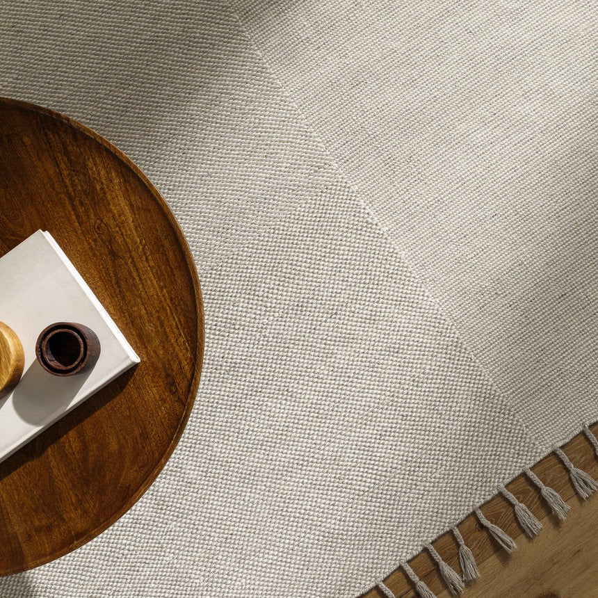 Abhay Cream Wool Area Rug - Clearance