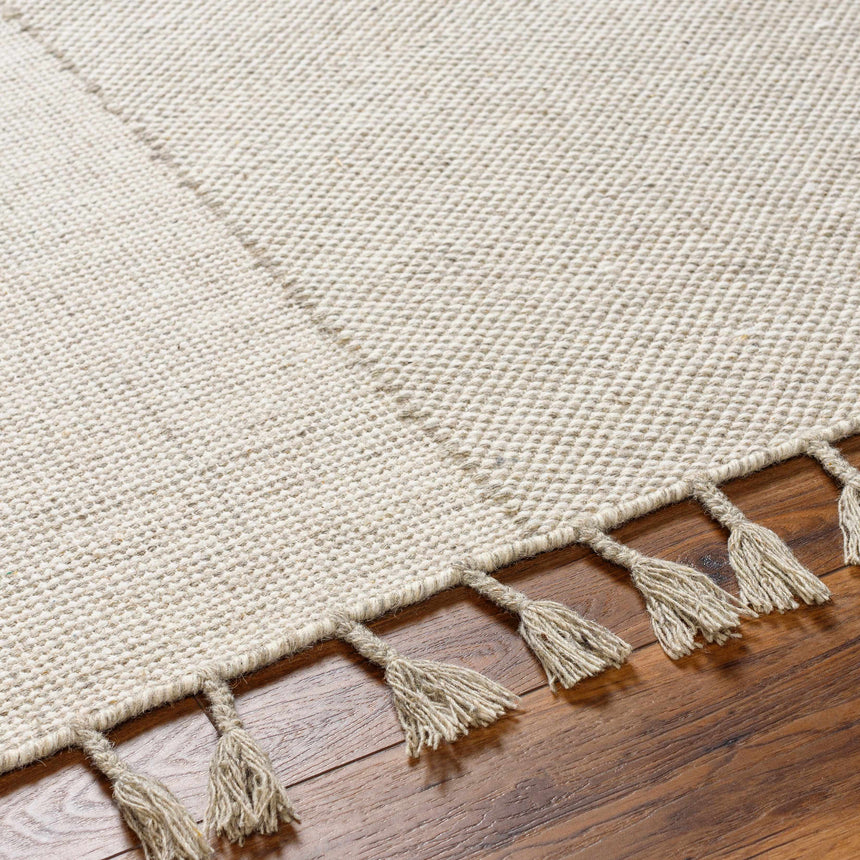 Abhay Cream Wool Area Rug - Clearance