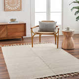 Transitional room scene with Abhay Beige Wool Area Rug, wood cabinet, chair, and side table. Roomscene-Rectangle
