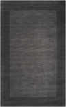 Close-up of a Bordered Solid Black Charcoal Wool Rug showing its subtle texture and color variations. Design-Rectangle-58