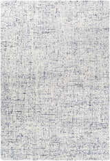 Close-up of the Tanana Area Rug. Cream rug with black and gray contemporary design. Hand-tufted wool texture. Design-Rectangle-576