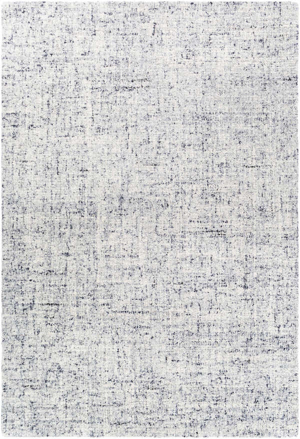 Close-up of the Tanana Area Rug. Cream rug with black and gray contemporary design. Hand-tufted wool texture. Design-Rectangle-576