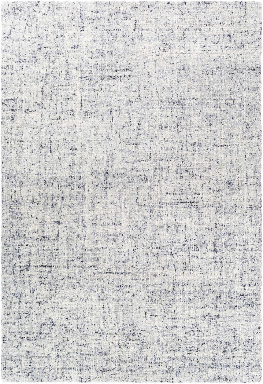 Close-up of the Tanana Area Rug. Cream rug with black and gray contemporary design. Hand-tufted wool texture. Design-Rectangle-576