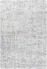 Close-up of the Tanana Area Rug. Cream rug with black and gray contemporary design. Hand-tufted wool texture. Design-Rectangle-576