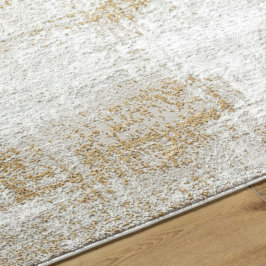 Close-up of the Tapko Tan Area Rug showing its Southwestern-style pattern and soft, textured polyester material. Texture