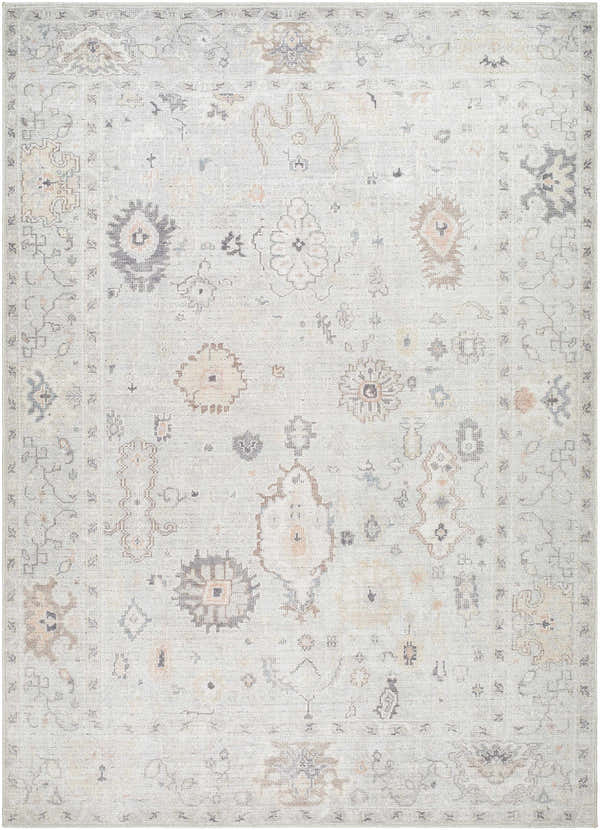 Close-up of the Taryn Area Rug. Farmhouse style rug with dusty pink, gray, and tan traditional pattern. Machine woven polyester. Design-Rectangle