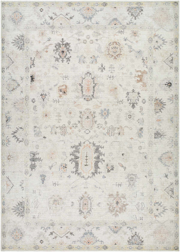 Close-up of the Trina Area Rug, a farmhouse style rug with charcoal, gray, and orange traditional patterns. Design-Rectangle