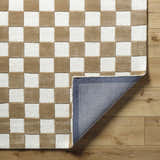 Close-up of the Timin Brown Checkered Wool Area Carpet showing cream and brown squares and the rug's backing. Fold