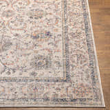 Close-up of the beige Temelec Area Rug showing its traditional, floral pattern with burnt orange and charcoal accents. Front