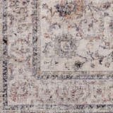 Close-up of the Temelec Area Rug, a beige polyester rug with burnt orange, charcoal, and slate floral and oriental patterns. Swatch