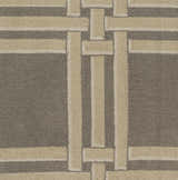Close-up of the hand-hooked Templeton Area Rug. Gray, ivory, and white wool form a contemporary geometric pattern. Swatch