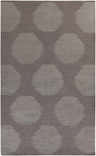 Close-up of the Tensed Area Rug. Charcoal wool rug with a contemporary striped circle pattern. Hand woven texture. Design-Rectangle-58